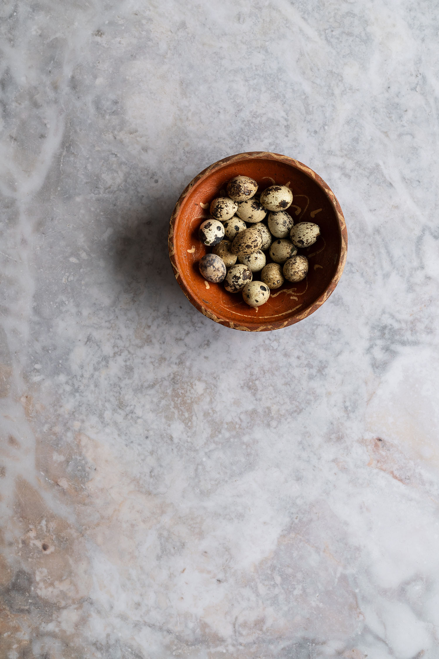 Marble food surface with orange details for video and photography