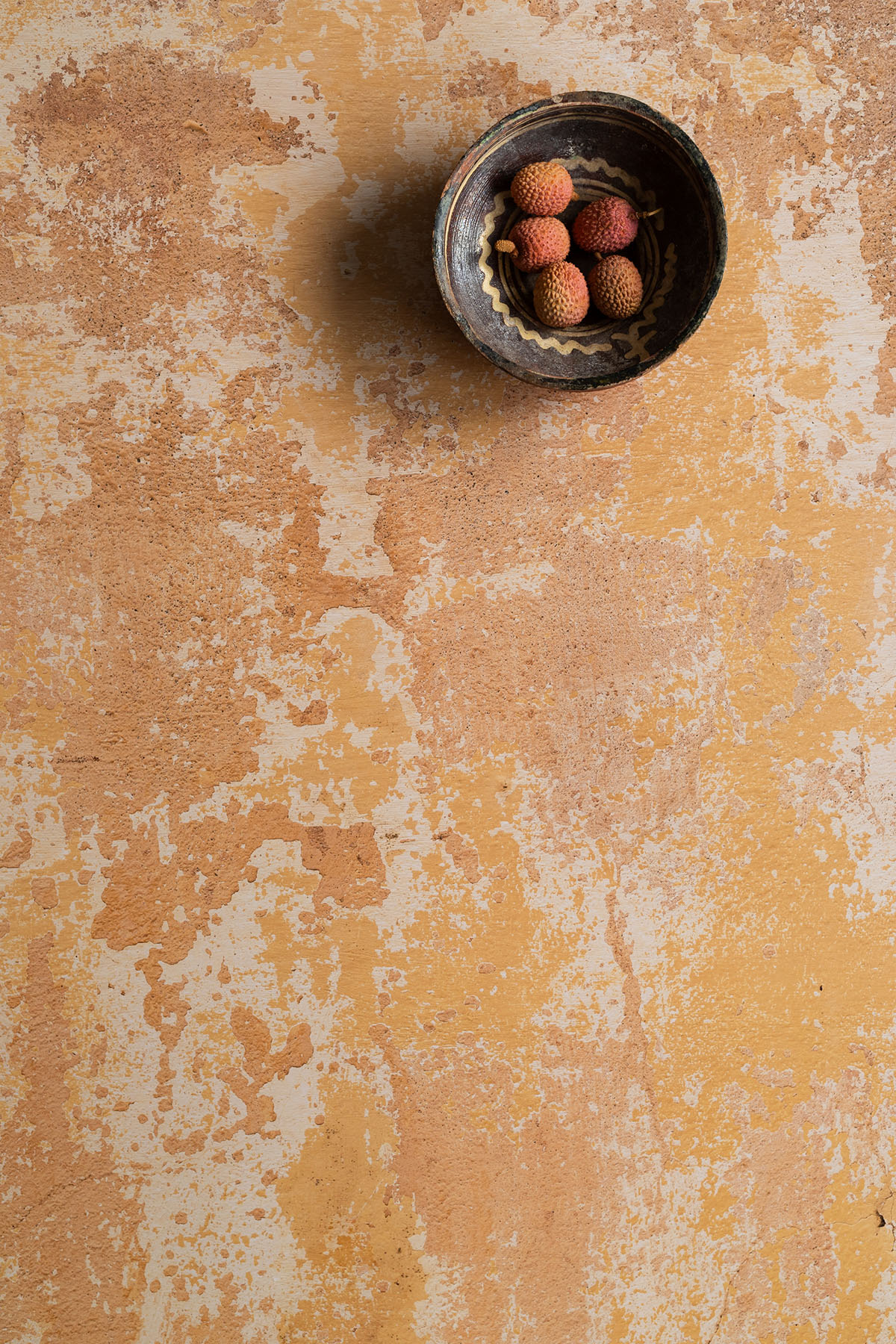 Plaster wall vinyl backdrop with beautiful orange apricot tones