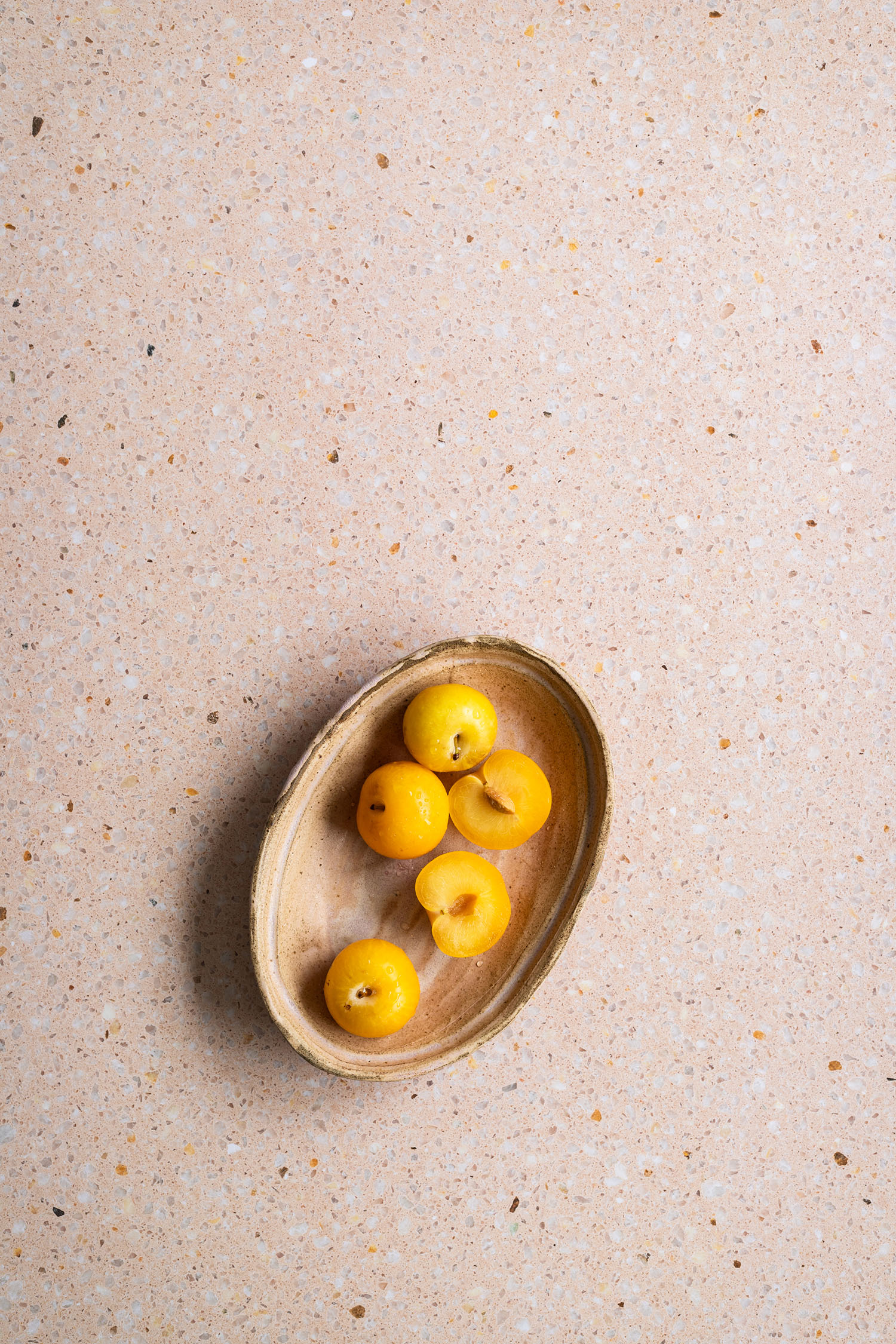 Pink peach tone terrazzo stone surface for photo and video work